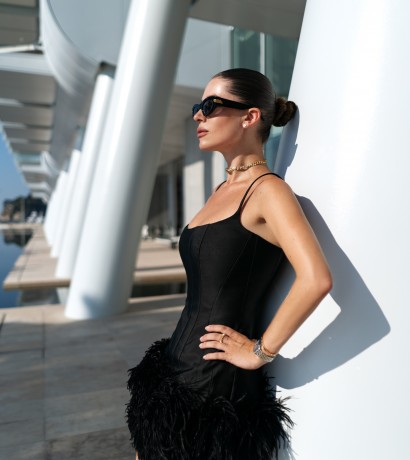 Black mini dress with feathers